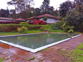STAYMAKER Aagani Gudda with Natural Water Pool
